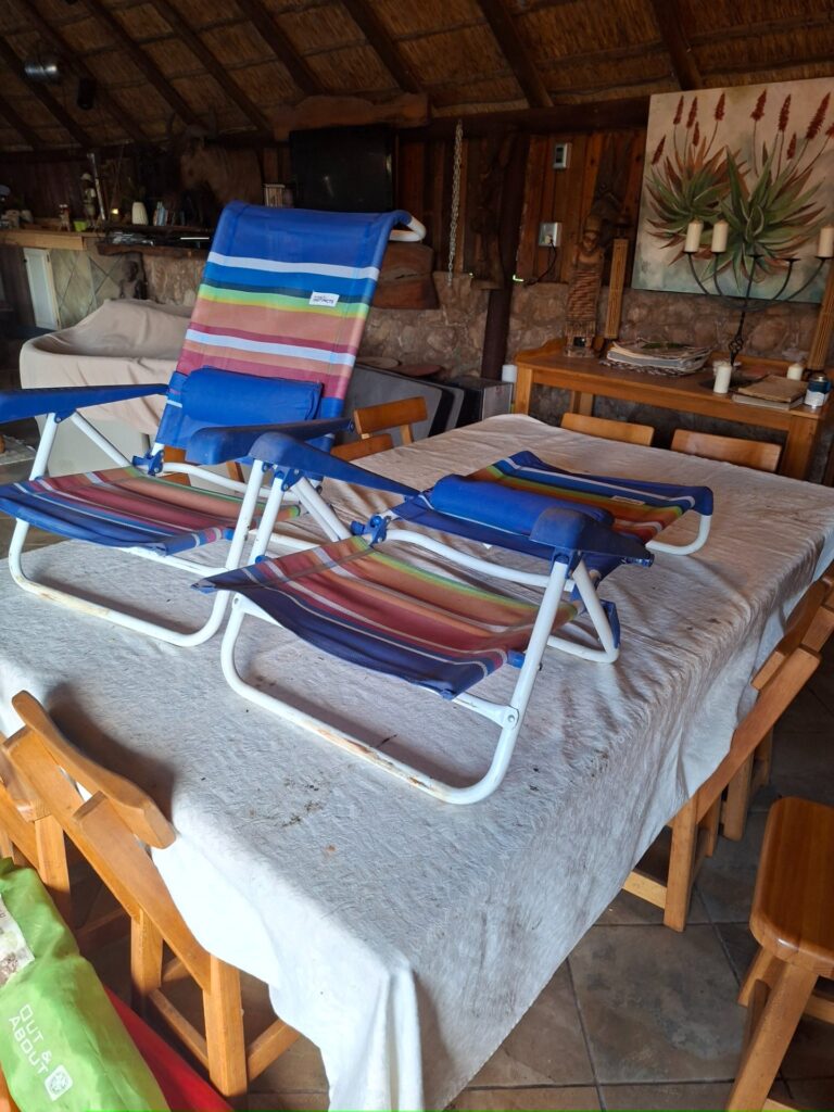 Pair of Natural Instincts folding reclining beach chairs – colourful woven fabric, padded head cushion, adjustable recline