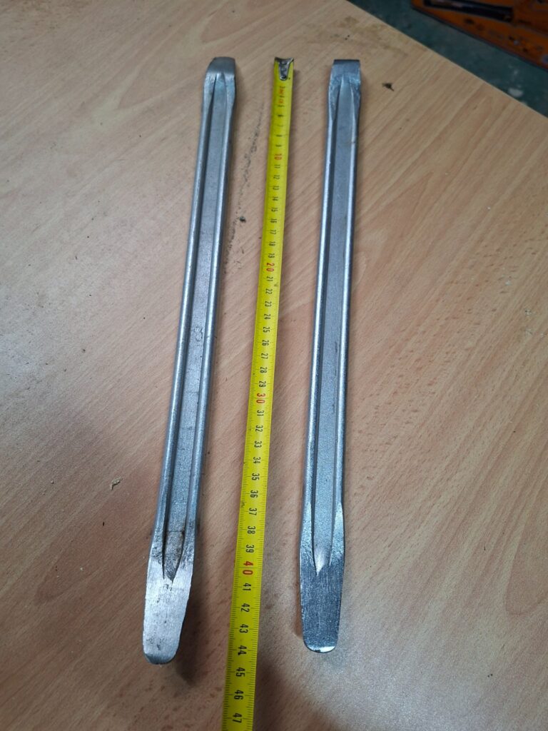 Pair of long metal pry bars / levers — approx 46–47 cm, used, light tip wear
