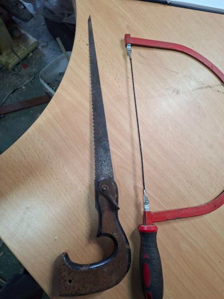 Mixed lot: vintage wooden-handled handsaw + junior hacksaw frame + spare blade — used, surface rust