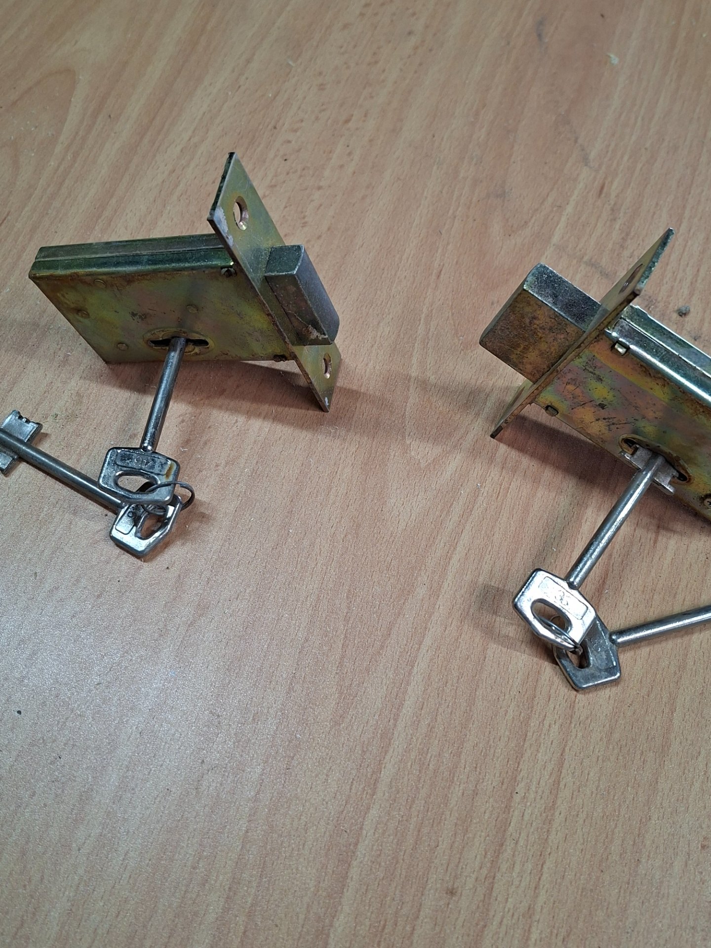 Pair of tubular/warded mortice cabinet / security door locks with long skeleton keys — tested working
