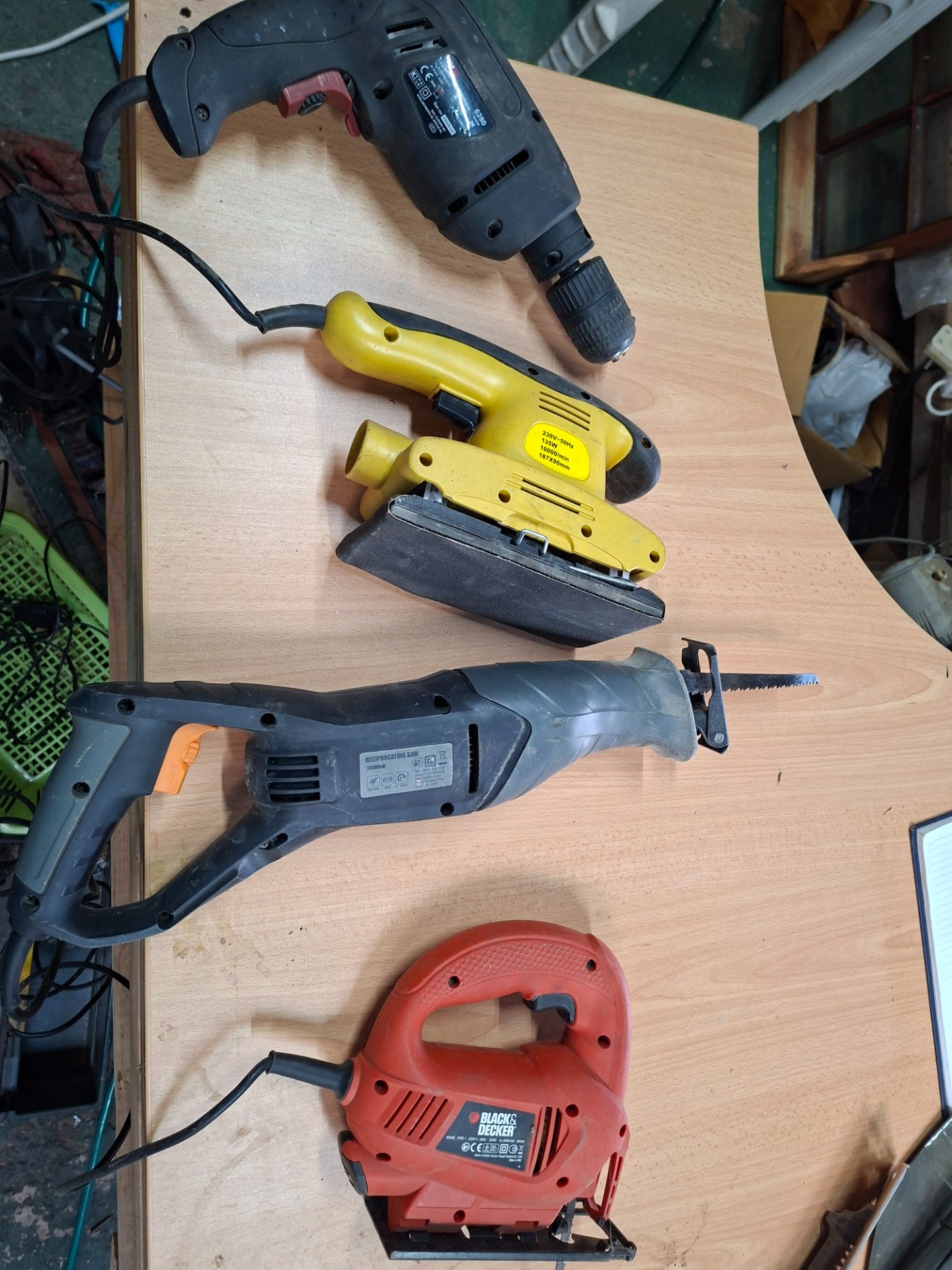 Mixed corded power tools: reciprocating saw, drill, yellow orbital sander (187x90mm), Black & Decker jigsaw — used, warehouse tested