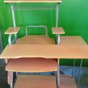 Large used computer office desk with multiple shelves and keyboard tray