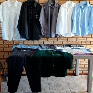 Mixed lot of 17 men's shirts and trousers — used clothing bundle