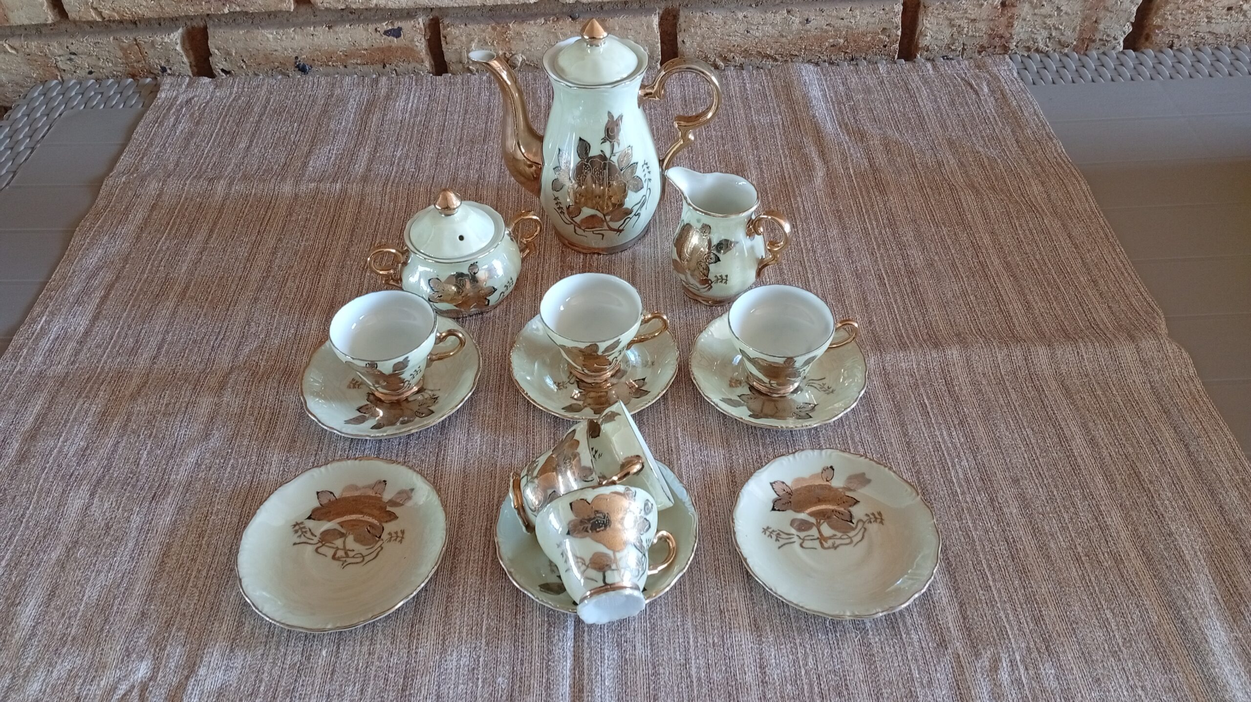 17-Piece Porcelain Tea Service (seller: matched teapot, creamer, sugar, cups & saucers)