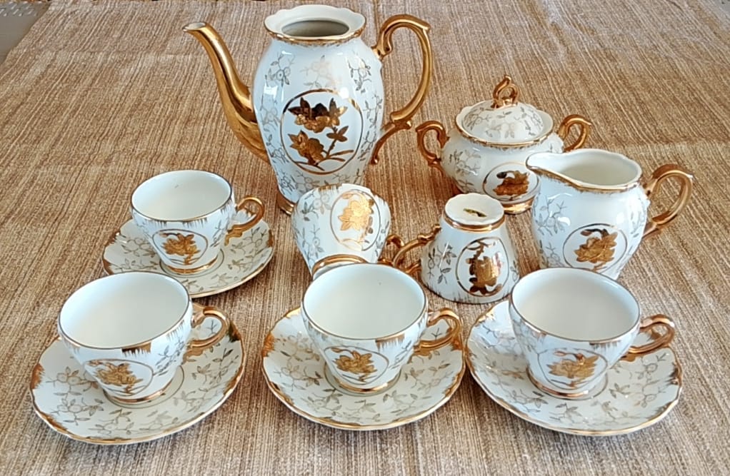 14-Piece White & Gold Tea Set (teapot repaired, incomplete set stated)