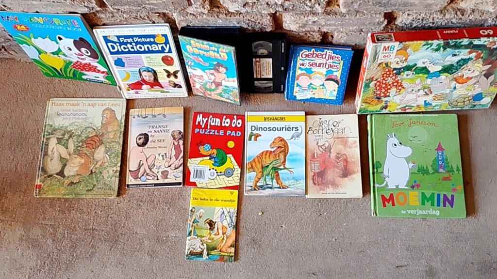 Lot of Various Used Children’s Books & VHS Cassette(s) — 13 items