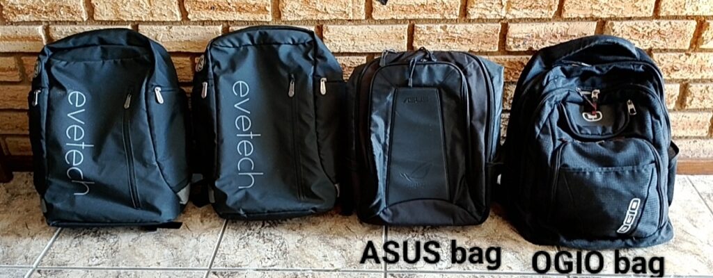 Lot of 4 Black Laptop Backpacks (2 Evetech, 1 ASUS, 1 OGIO)