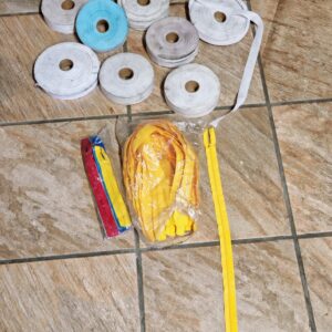 Bundle of Seamstress Ribbons / Tape Rolls and Yellow Zippers (Lot)