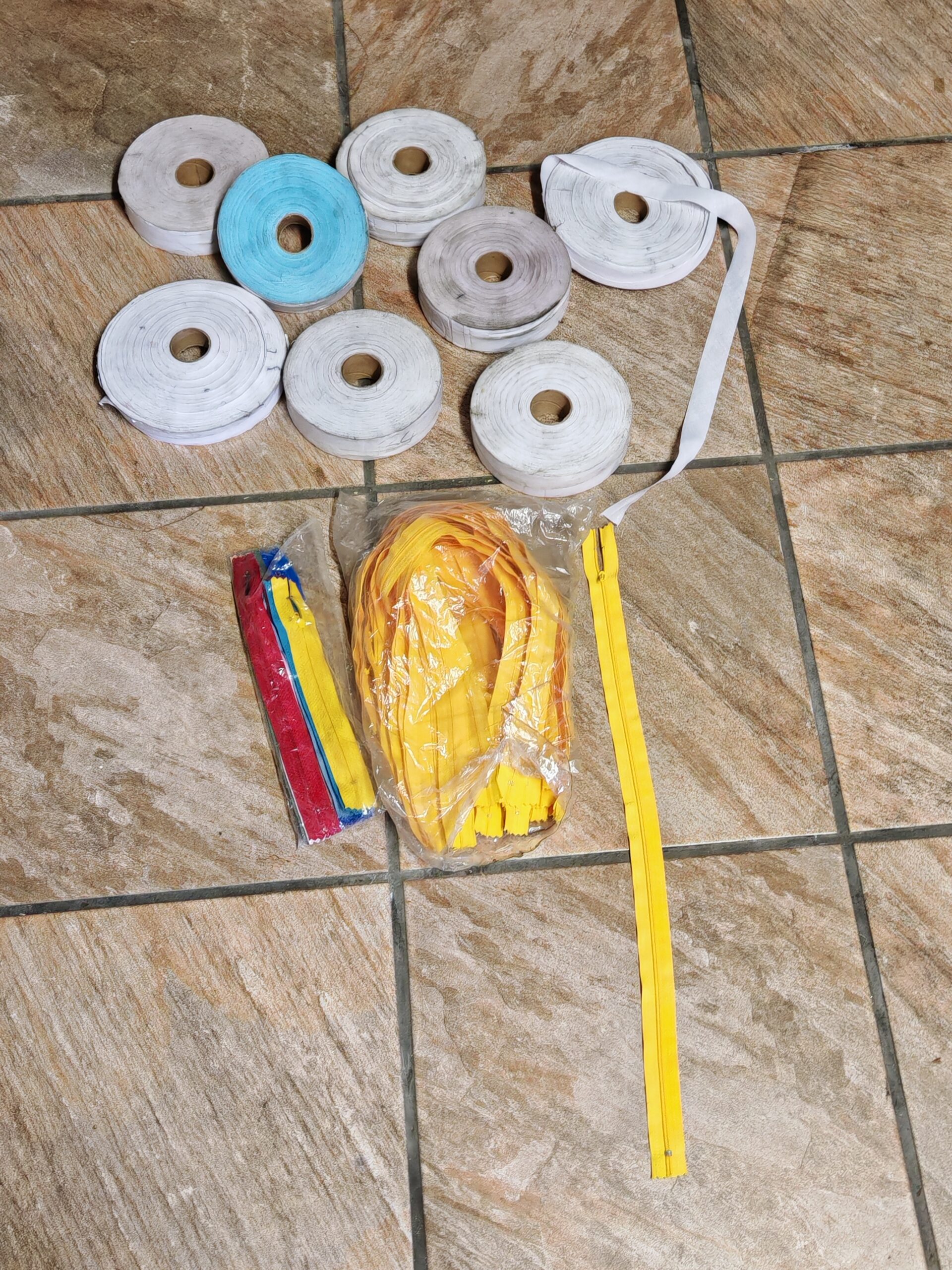 Bundle of Seamstress Ribbons / Tape Rolls and Yellow Zippers (Lot)