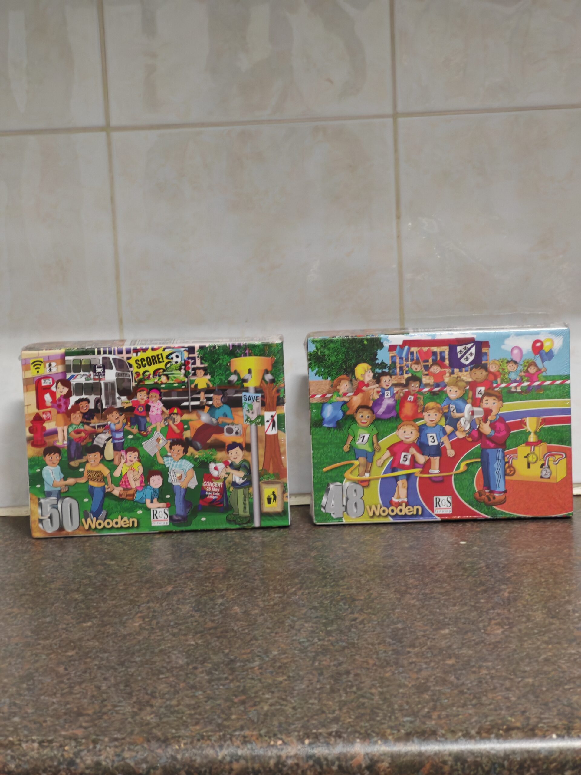 Pair of RGS Boxed Wooden Jigsaw Puzzles (48 & 50 pcs)