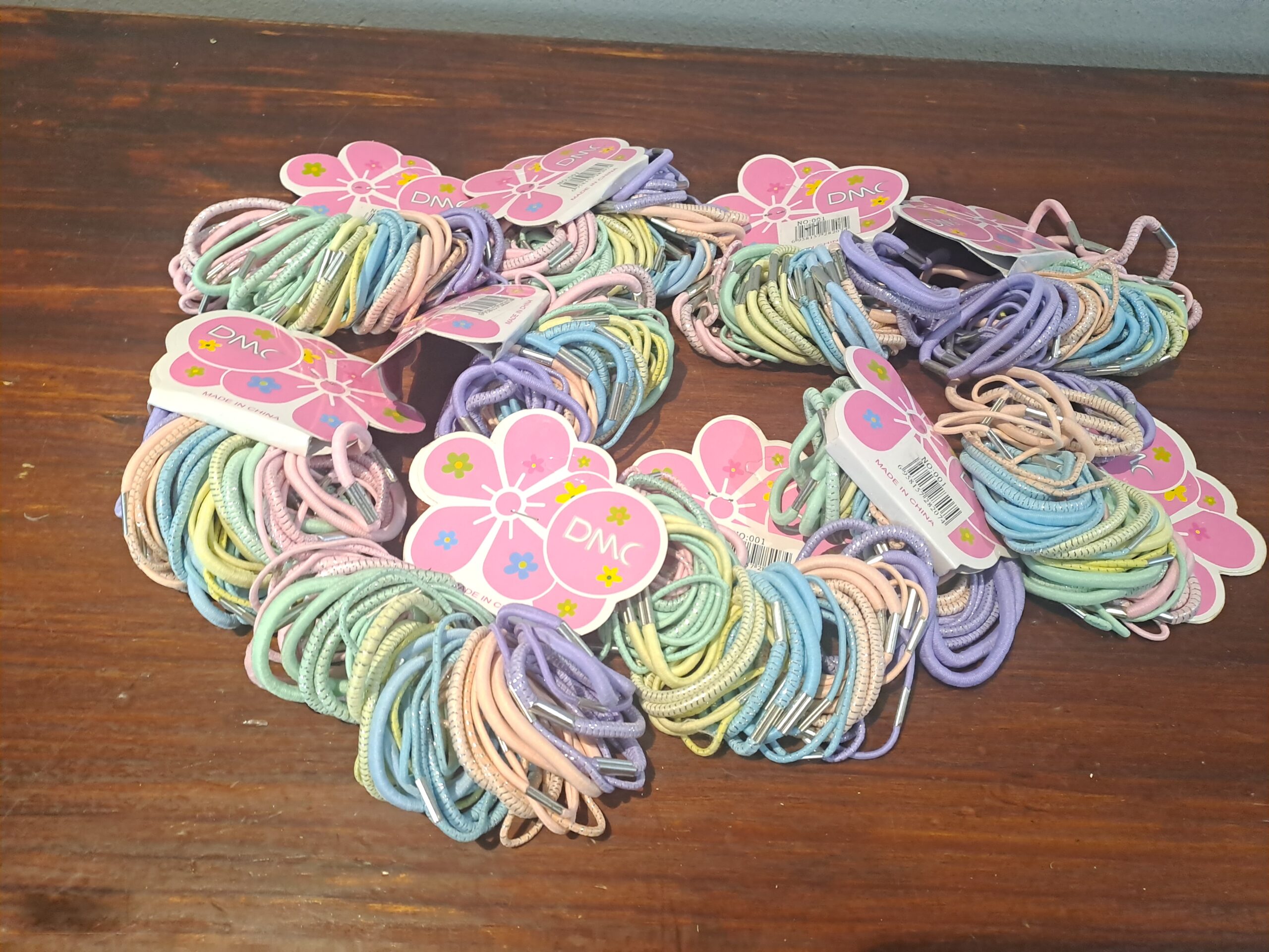 Lot of 10 packs — DMC pastel girls’ hair bands (retail carded)