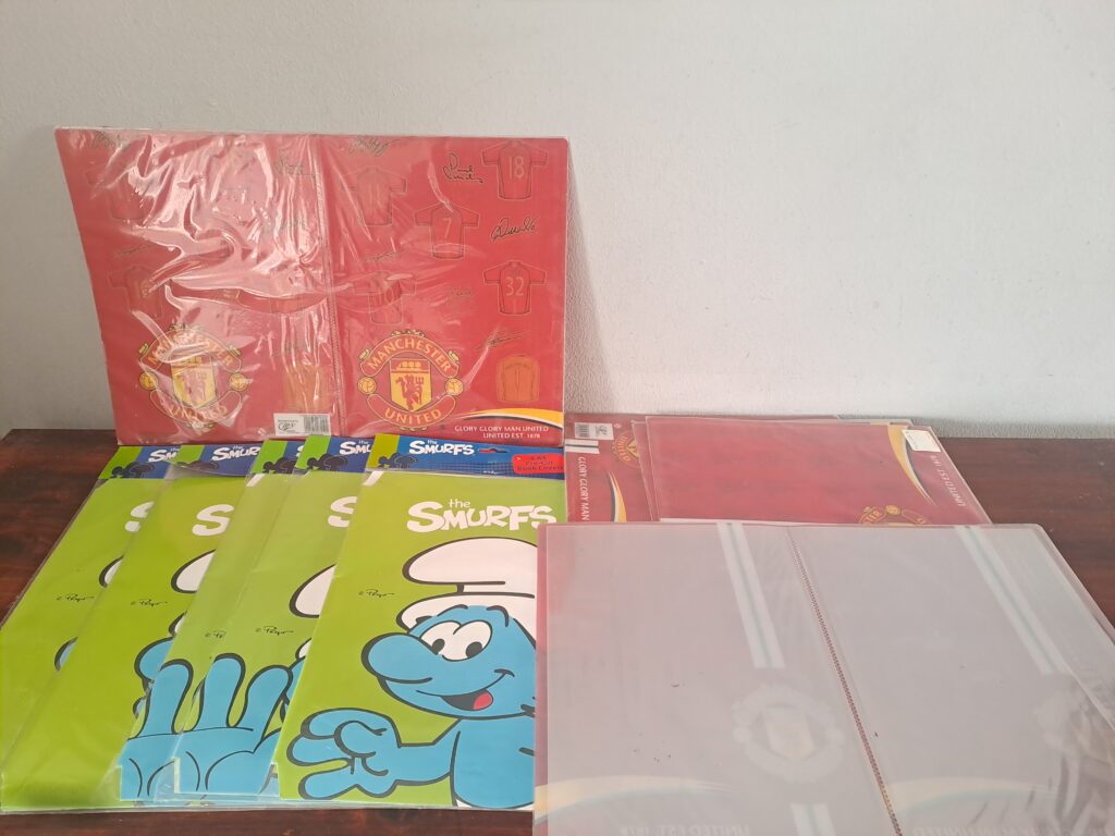 Mixed Decorative Plastic Sleeves / Folders – Smurfs & Manchester United Designs (Lot)