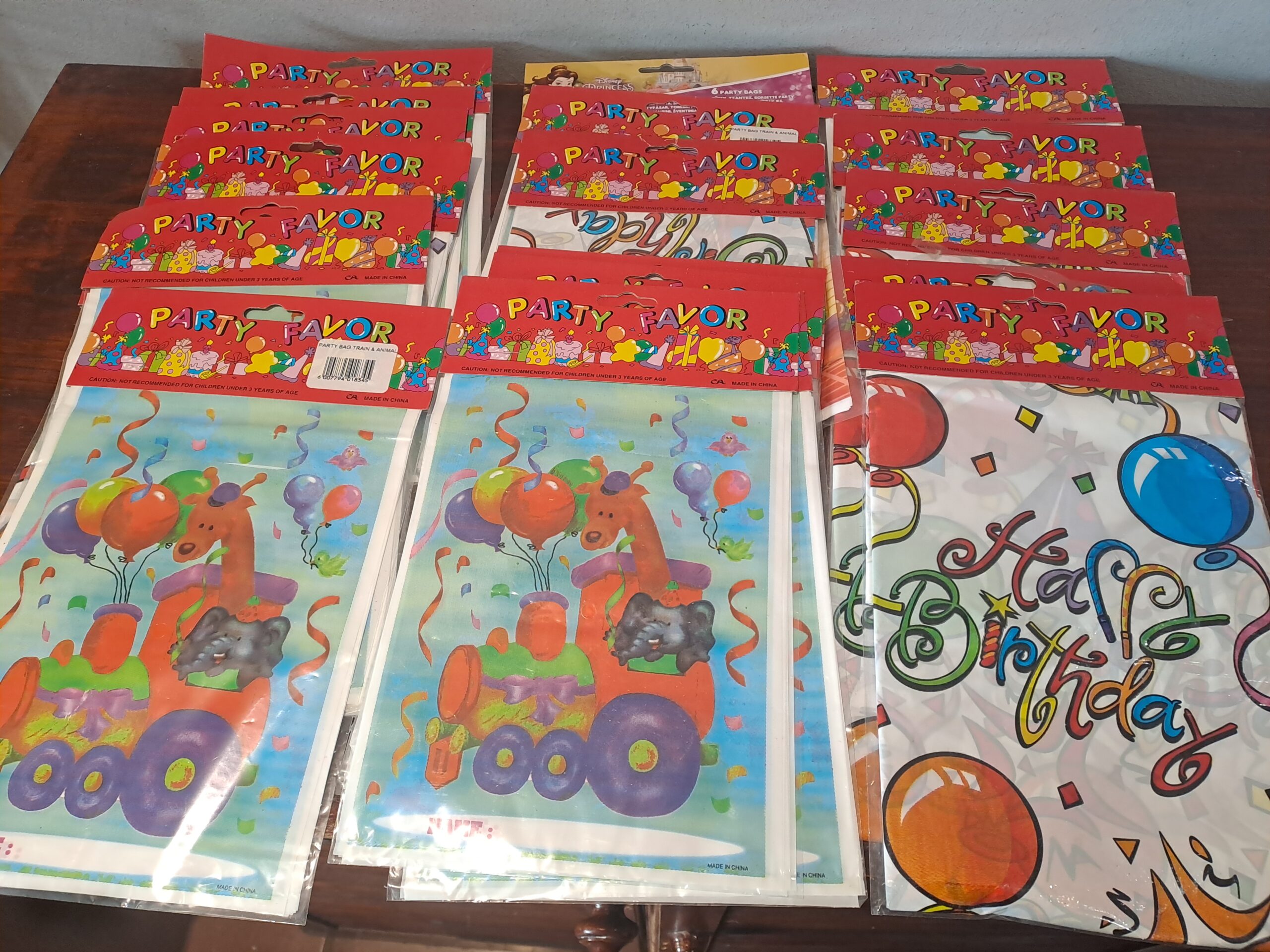 Lot of Party Plastic Tablecloths & Goodie/Party Favor Packs (approx. 18 packs)