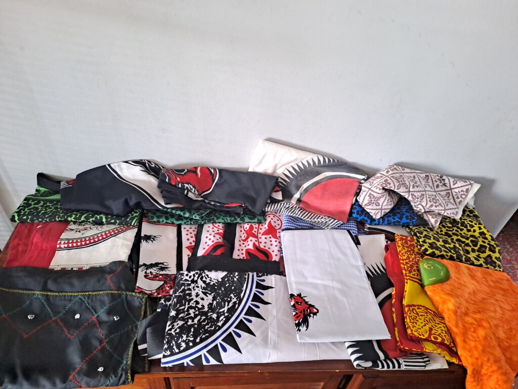 Large Bundle of Assorted Folded Traditional-Style Textiles (Approx. 12–15pcs)