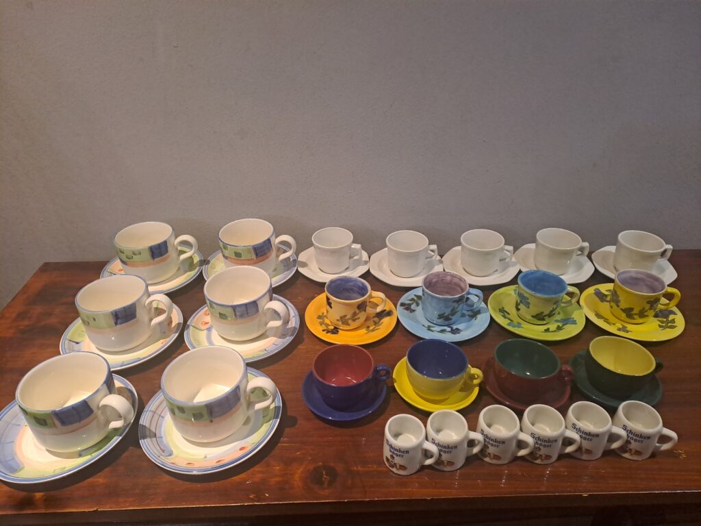 Assorted teacups & saucers mixed lot — approx. 25 pieces, various styles