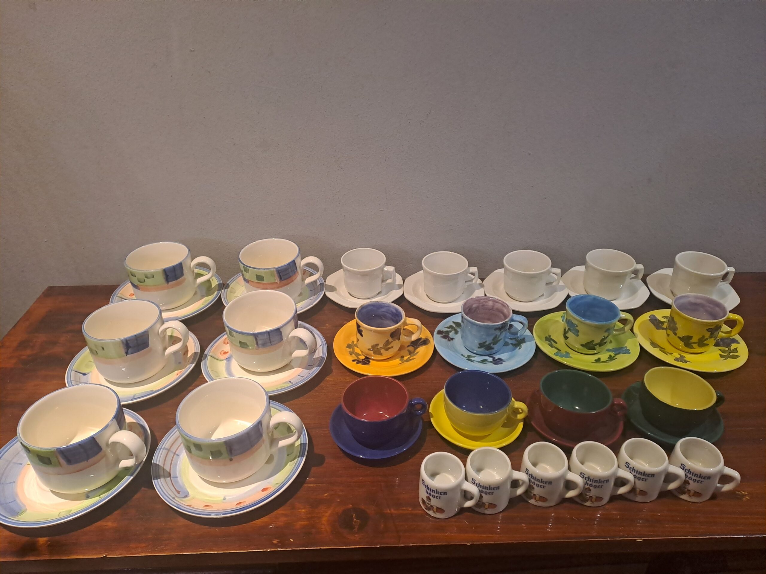 Assorted teacups & saucers mixed lot — approx. 25 pieces, various styles