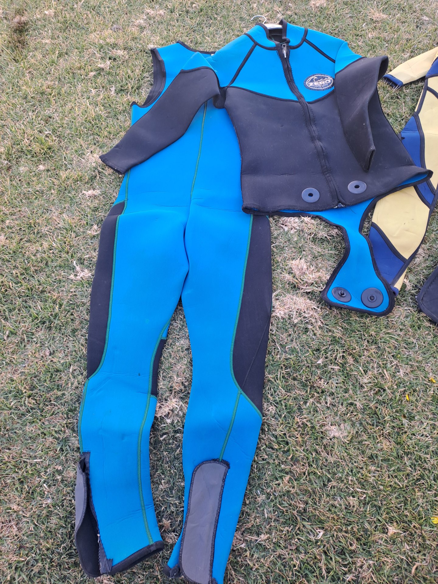 Bulk Lot of 4 Assorted Wetsuits – Adult & Child Sizes, Used, ZERO Brand Included