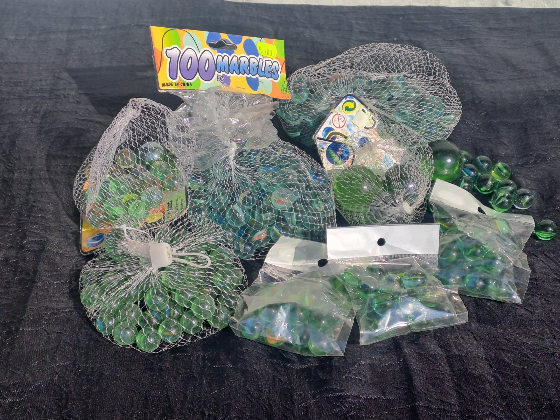 Lot of approx. 300 Green Glass Marbles – New nets & sealed bags (mix of sizes)