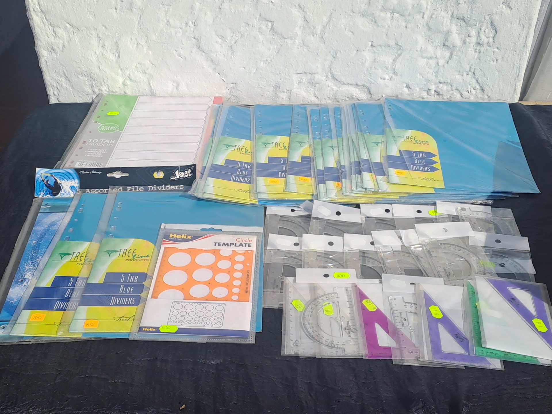 Mixed stationery lot — TreeLine 5‑tab dividers, Helix templates, Faber‑Castell set squares, clear protractors & rulers (bulk, sealed packs)