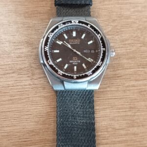 Seiko Quartz 'Sports 100' Wristwatch — Day/Date Dial, Woven Strap