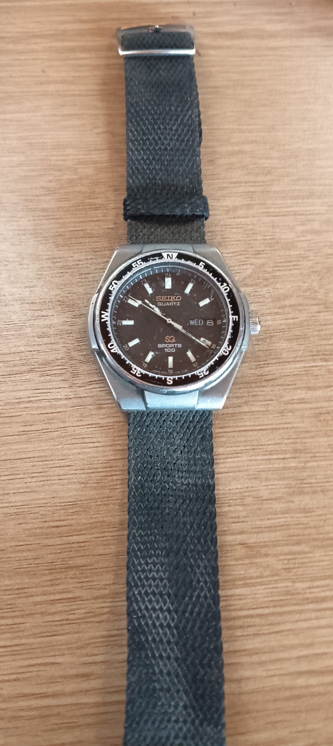 Seiko Quartz ‘Sports 100’ Wristwatch — Day/Date Dial, Woven Strap