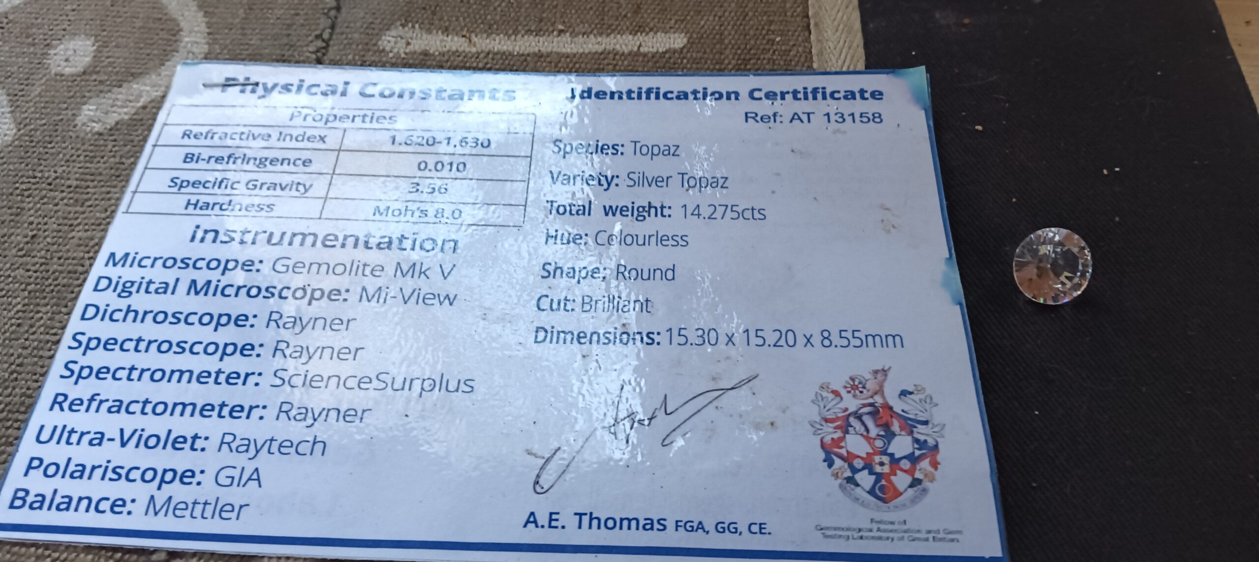 Loose Round Brilliant Silver Topaz, 14.275 ct (certificate shown)