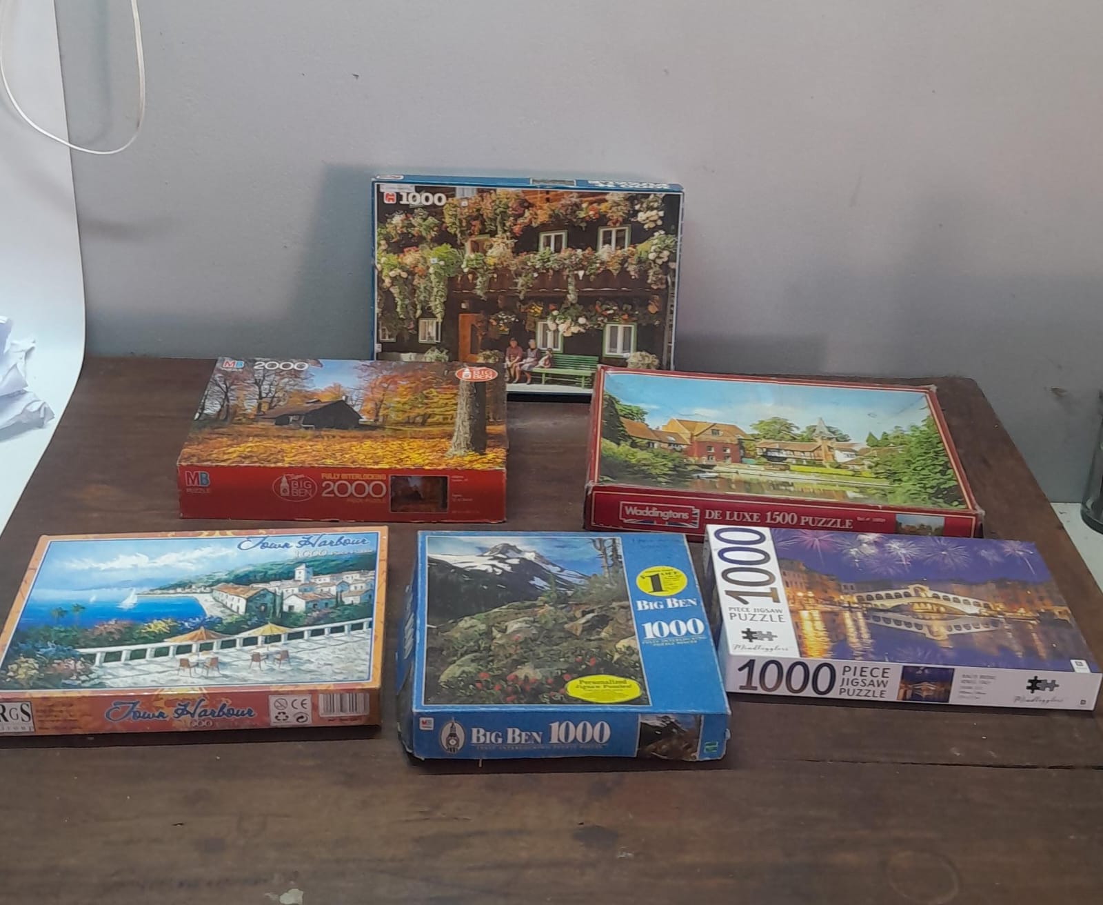 Lot of 6 Boxed Jigsaw Puzzles (1000–2000pc visible counts) — Mixed Brands
