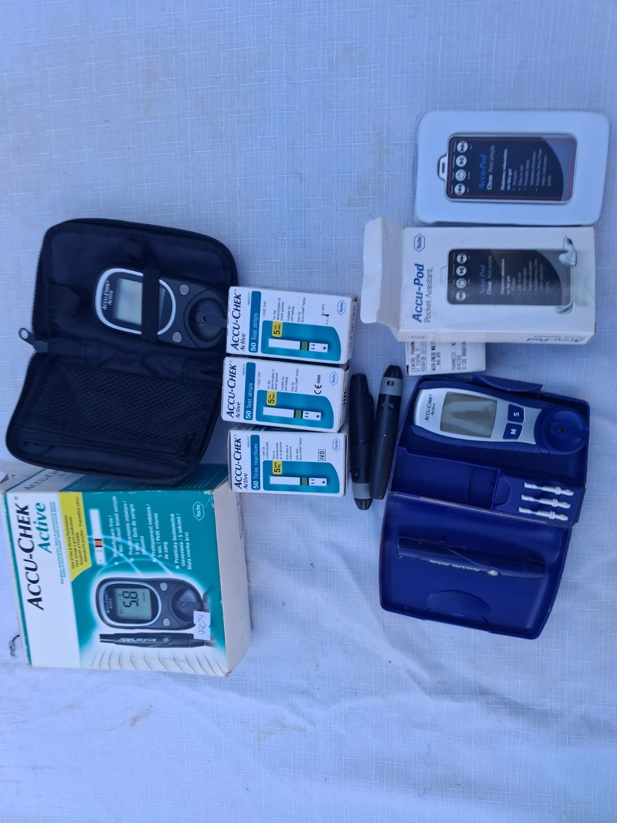 Accu-Chek bundle — glucose meters, test strips, lancing devices & cases