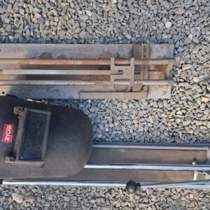 Pair of Manual Tile Cutters — 2x Set (one Ryobi, one heavily rusted)
