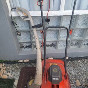 Flymo E300 electric lawn mower with electric line trimmer — 2-item garden tool bundle