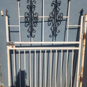 Decorative Metal Security Panel / Gate with Scrollwork — White Frame, Rusted Areas