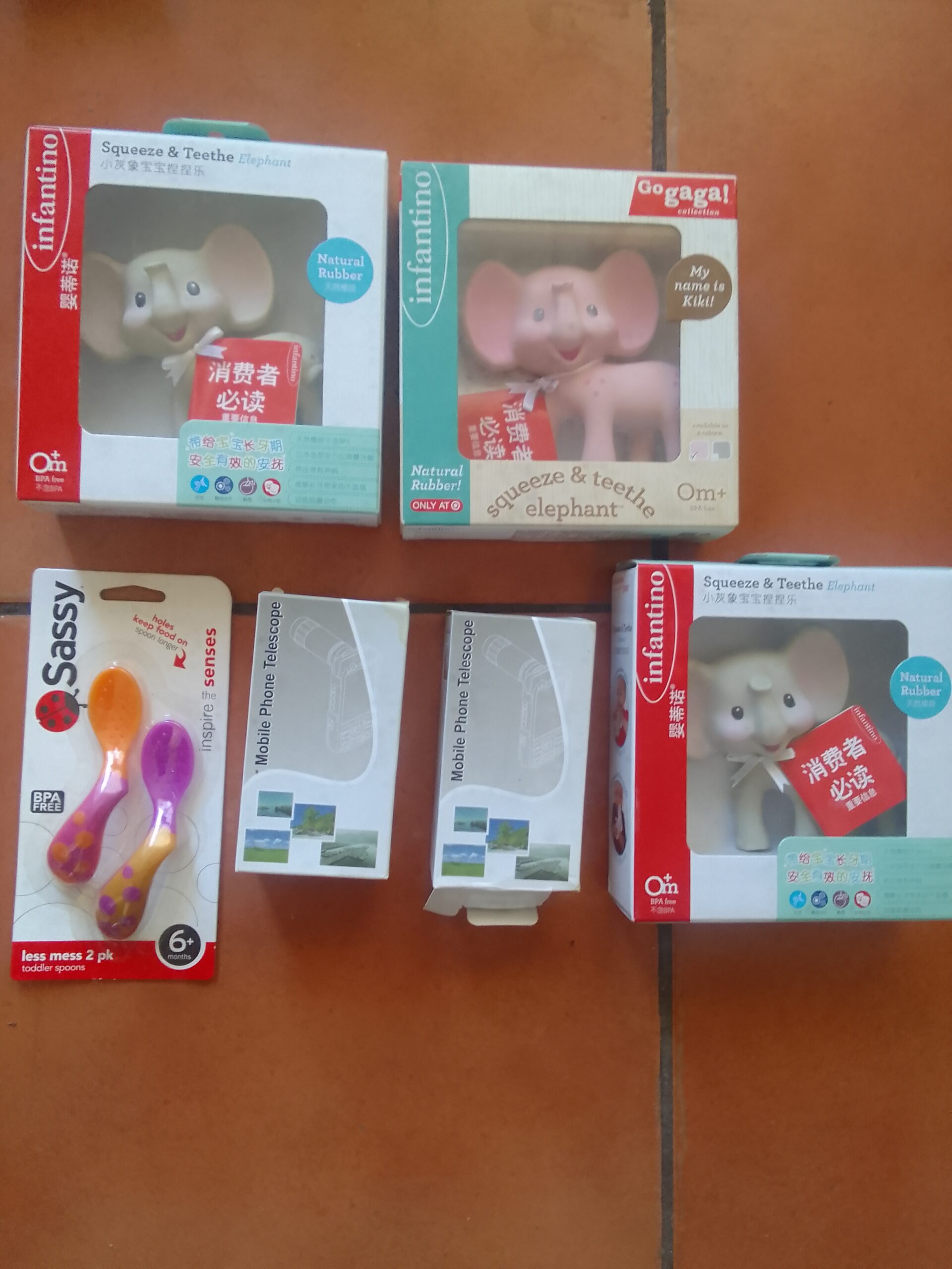 Mixed lot: Infantino Squeeze & Teethe elephants, Sassy spoons & 2 mobile phone telescopes (6pcs