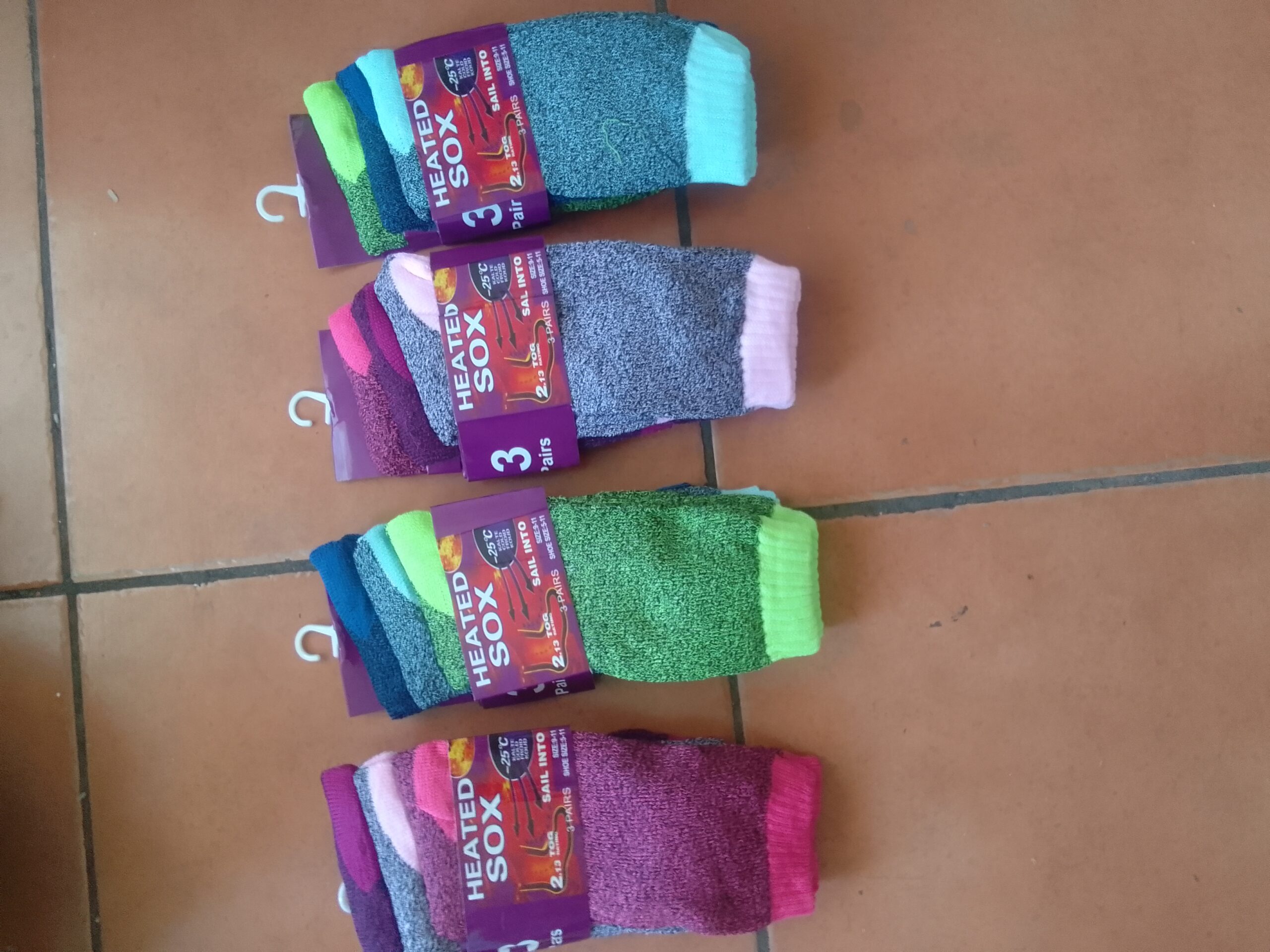 Lot of 12 Pairs – HEATED SOX, packaged (4 x 3-pair packs), multi-coloured