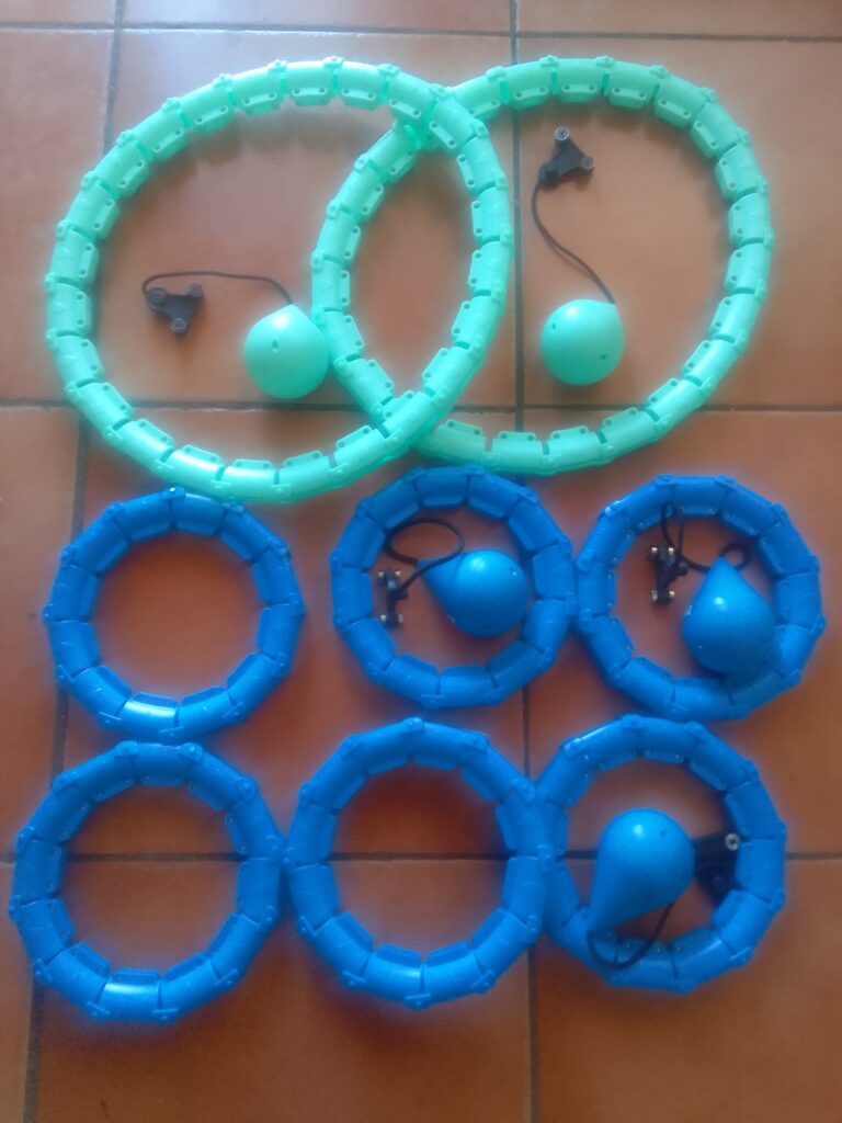 Lot of 8 Segmented Body-Shaping Hula Hoops (2 Green, 6 Blue) — Used, Incomplete