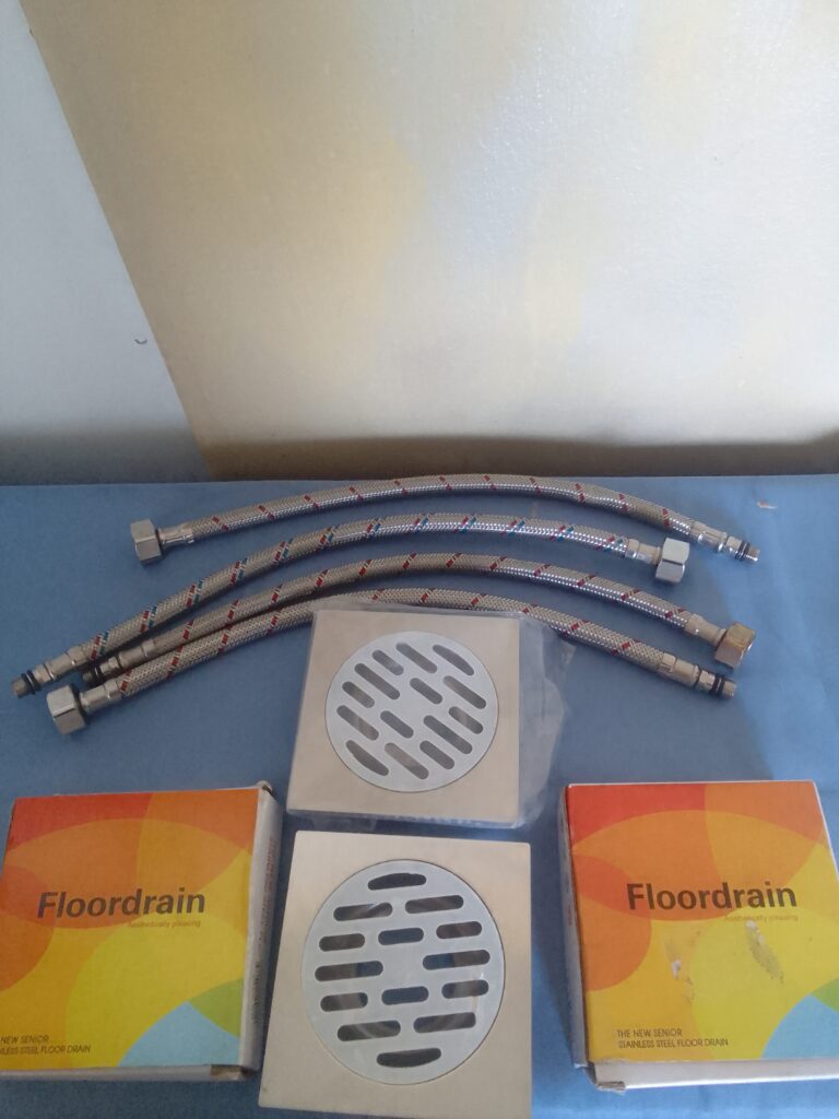 Lot of Floordrain Floor Drains with Braided Supply Hoses (New, boxed)