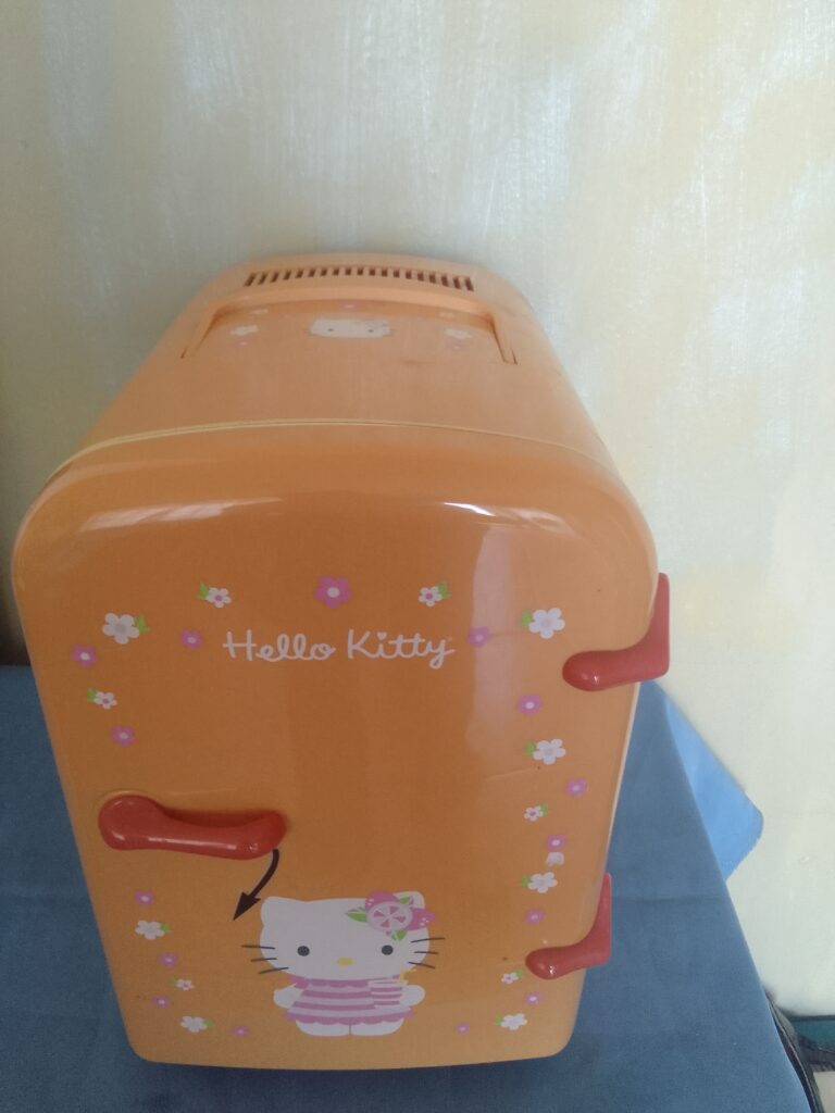 Orange Hello Kitty Mini Fridge — Compact Countertop Refrigerator, Interior Shelf