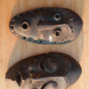 Pair of vintage carved wooden masks — small decorative masks, 25cm x 16cm each