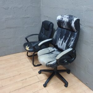 Pair of office chairs — high-back swivel + guest cantilever (damaged upholstery)