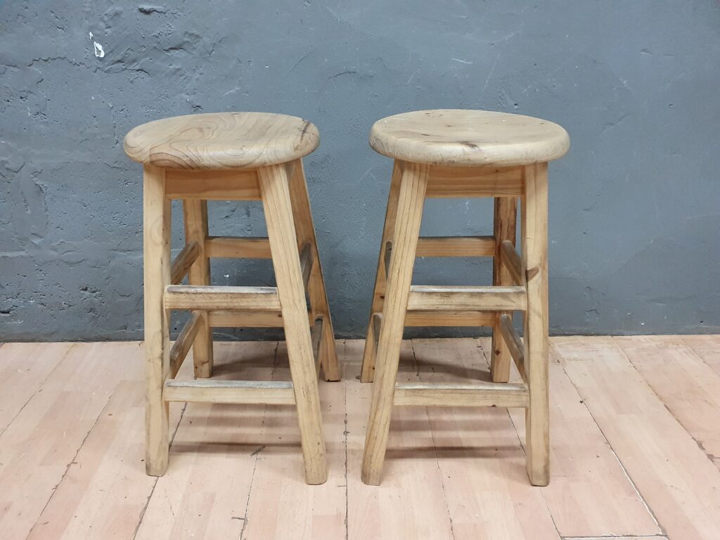 Pair of round-top wooden stools, light natural tone, 34cm dia x 68cm H (seller-measure)