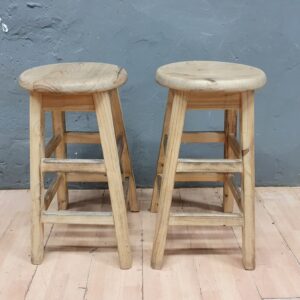 Pair of round-top wooden stools, light natural tone, 34cm dia x 68cm H (seller-measure)