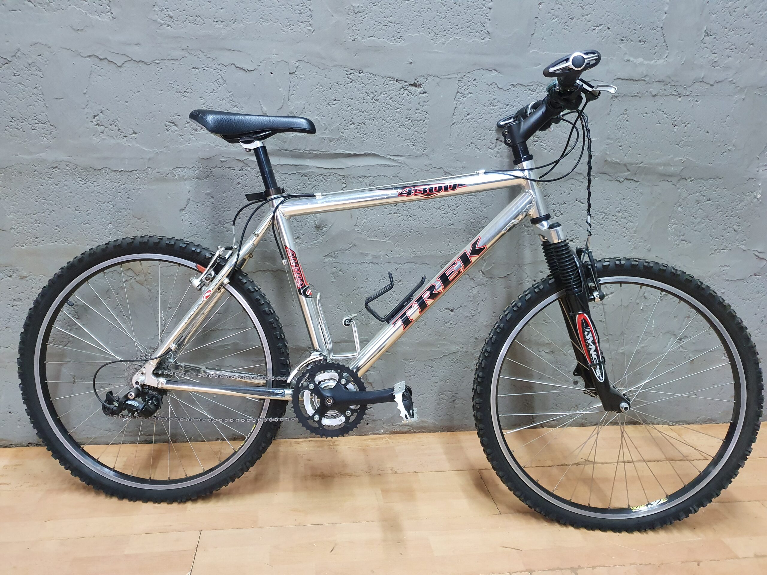 Trek 4300 Mountain Bicycle — Silver Frame with Front Suspension