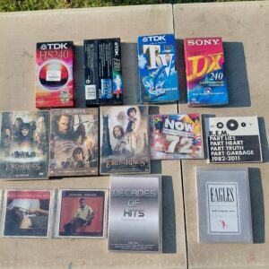 Mixed lot of DVDs, CDs and 4 boxed blank VHS tape boxes (Lot 10)