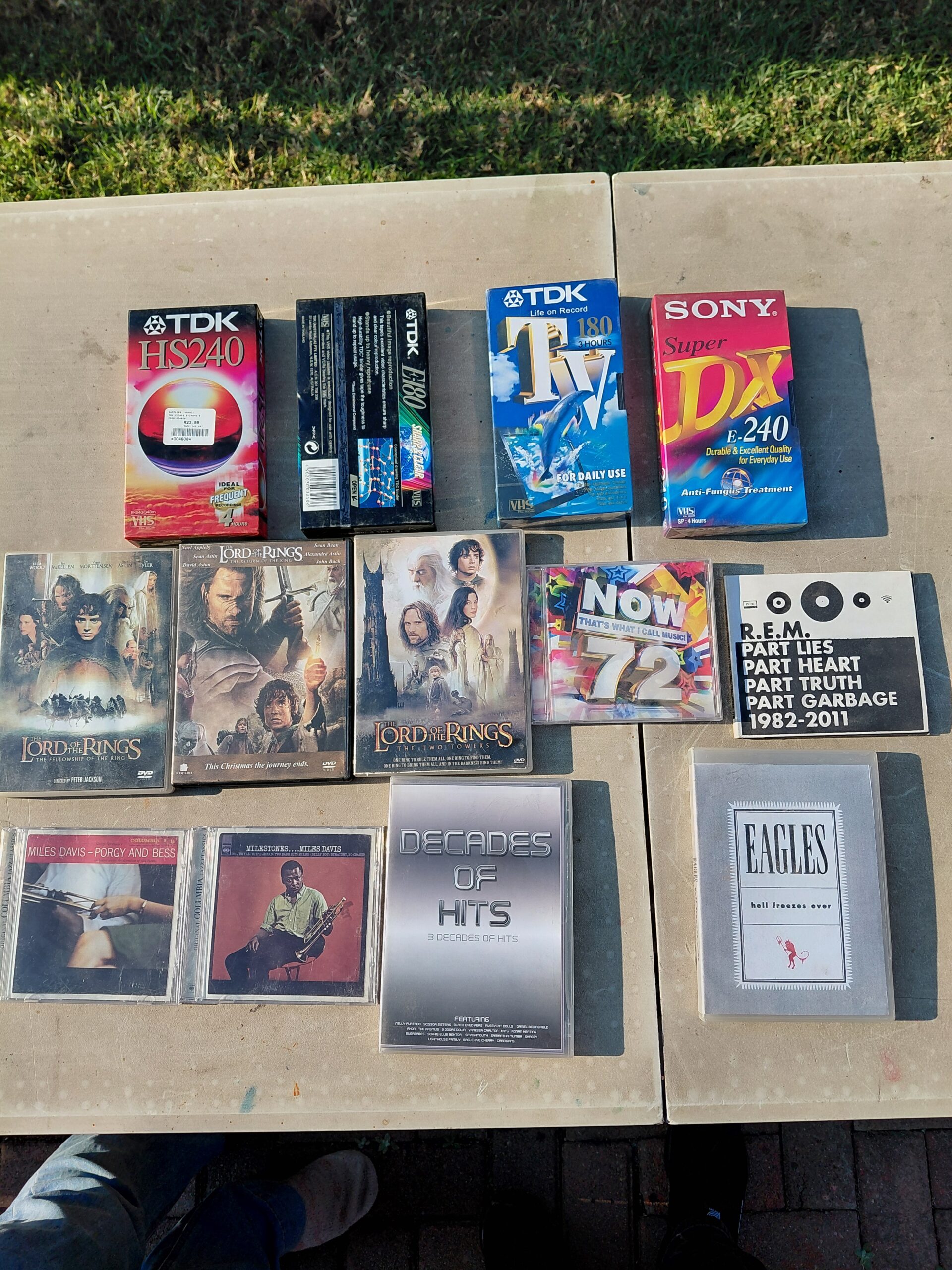 Mixed lot of DVDs, CDs and 4 boxed blank VHS tape boxes (Lot 10)