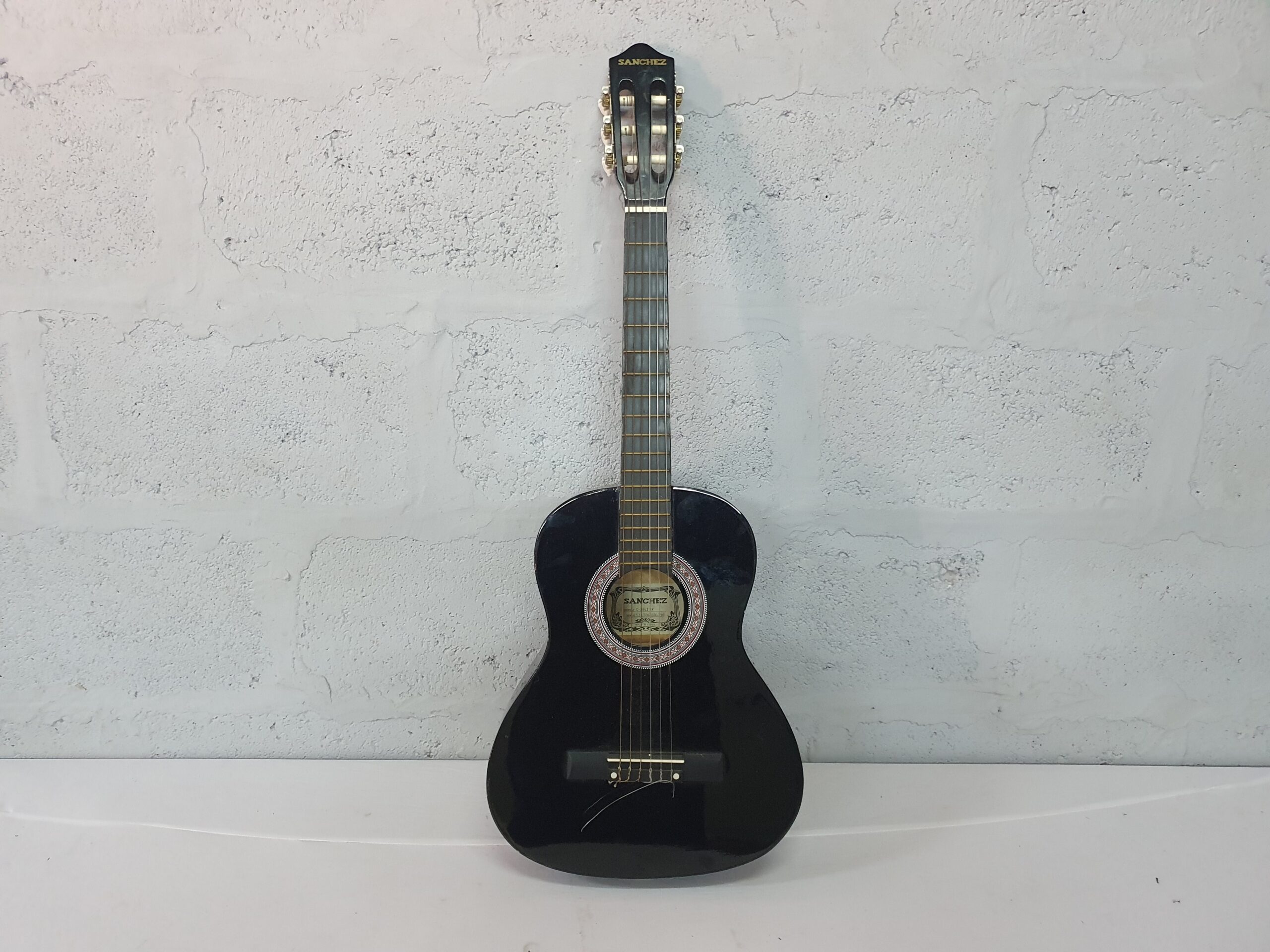 Black Classical Acoustic Guitar (Sanchez label) — Used, Fair Condition