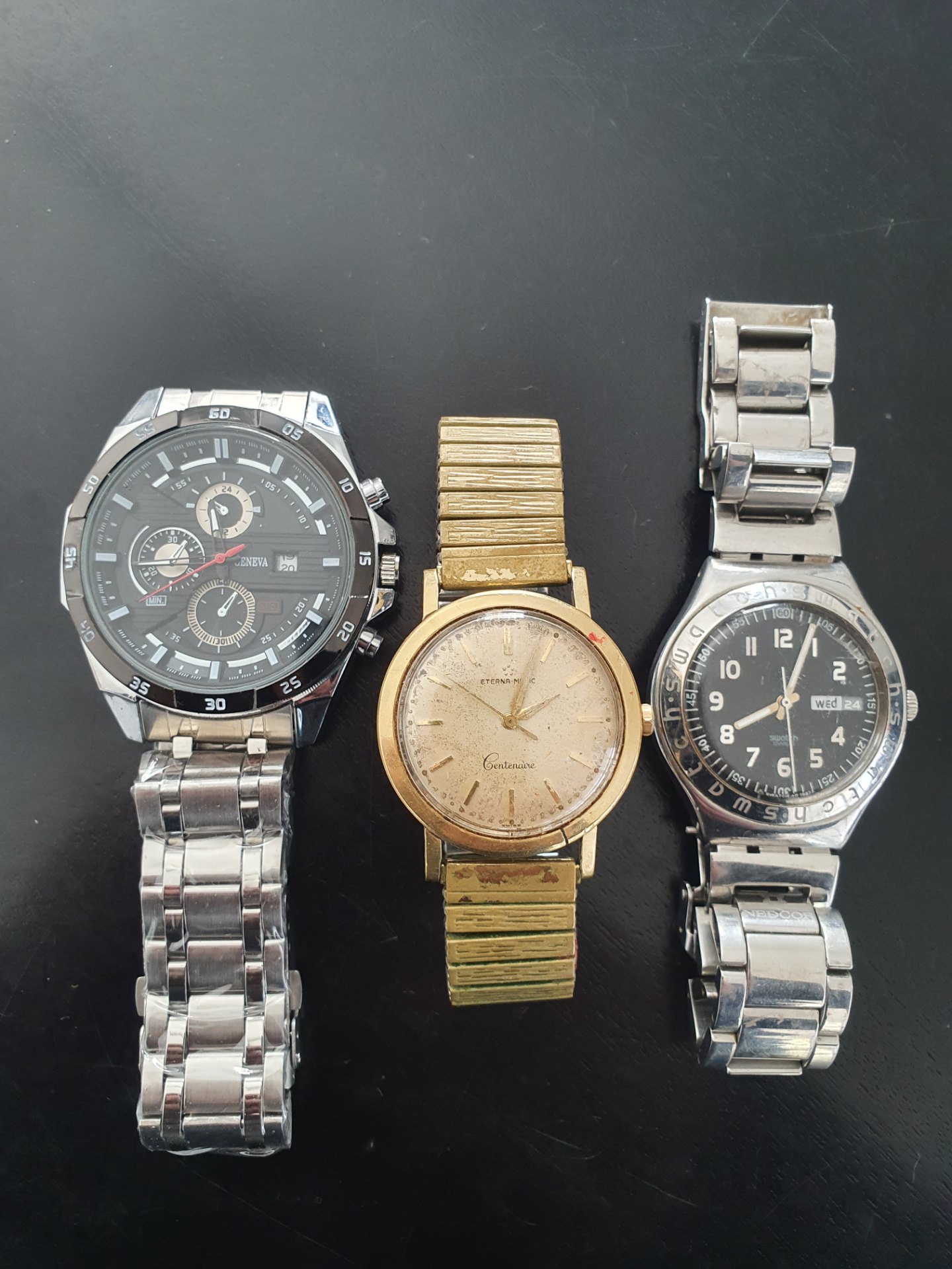 Lot of 3 wristwatches — Swatch (TRON Y back), Eterna-Matic Centenaire (gold) and large Geneva-style (mixed condition, NOT WORKING)