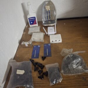 Mixed lot of assorted small parts & accessories including ACDelco bottle and WiFi device