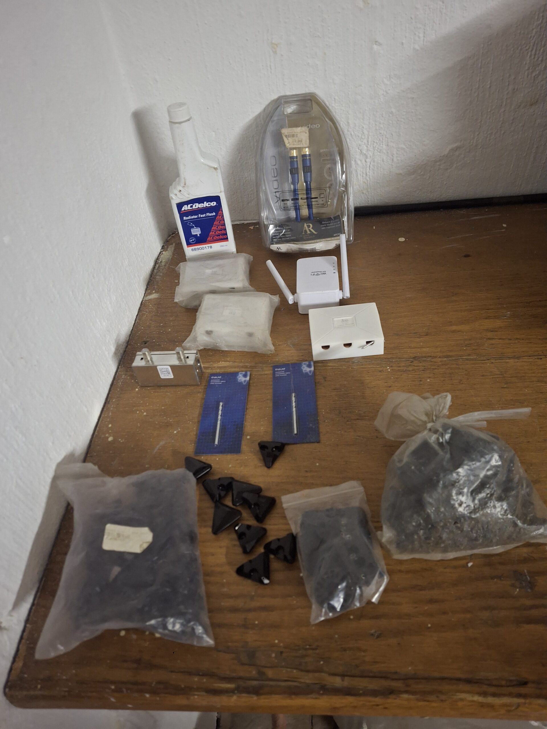Mixed lot of assorted small parts & accessories including ACDelco bottle and WiFi device