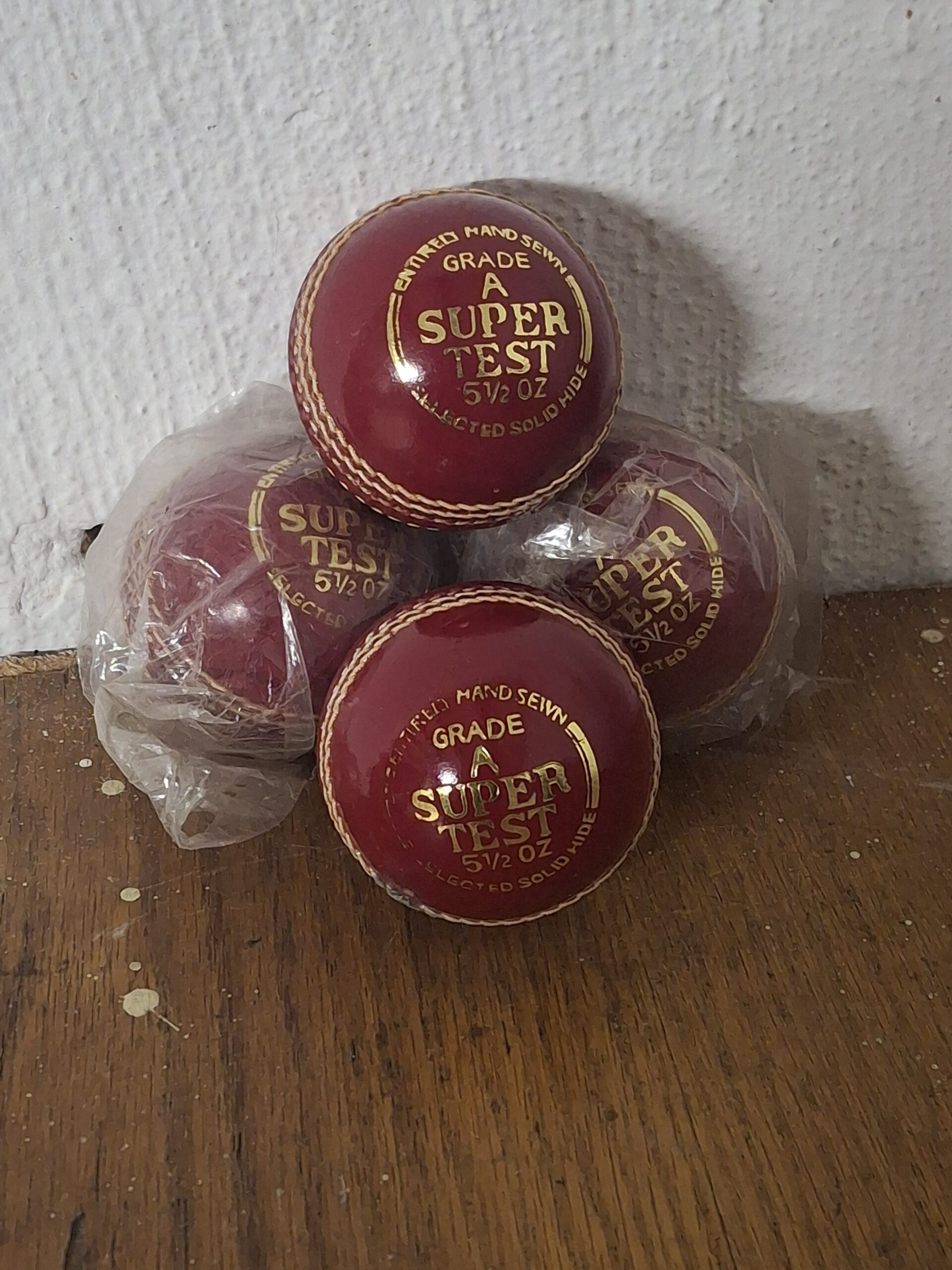 Set of 4 Red ‘SUPER TEST’ Cricket Balls (5 1/2 OZ, printed)