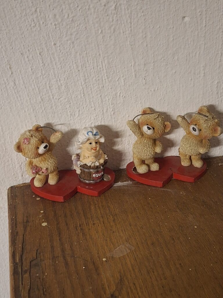 Set of 4 Decorative Figurines on Red Heart Bases