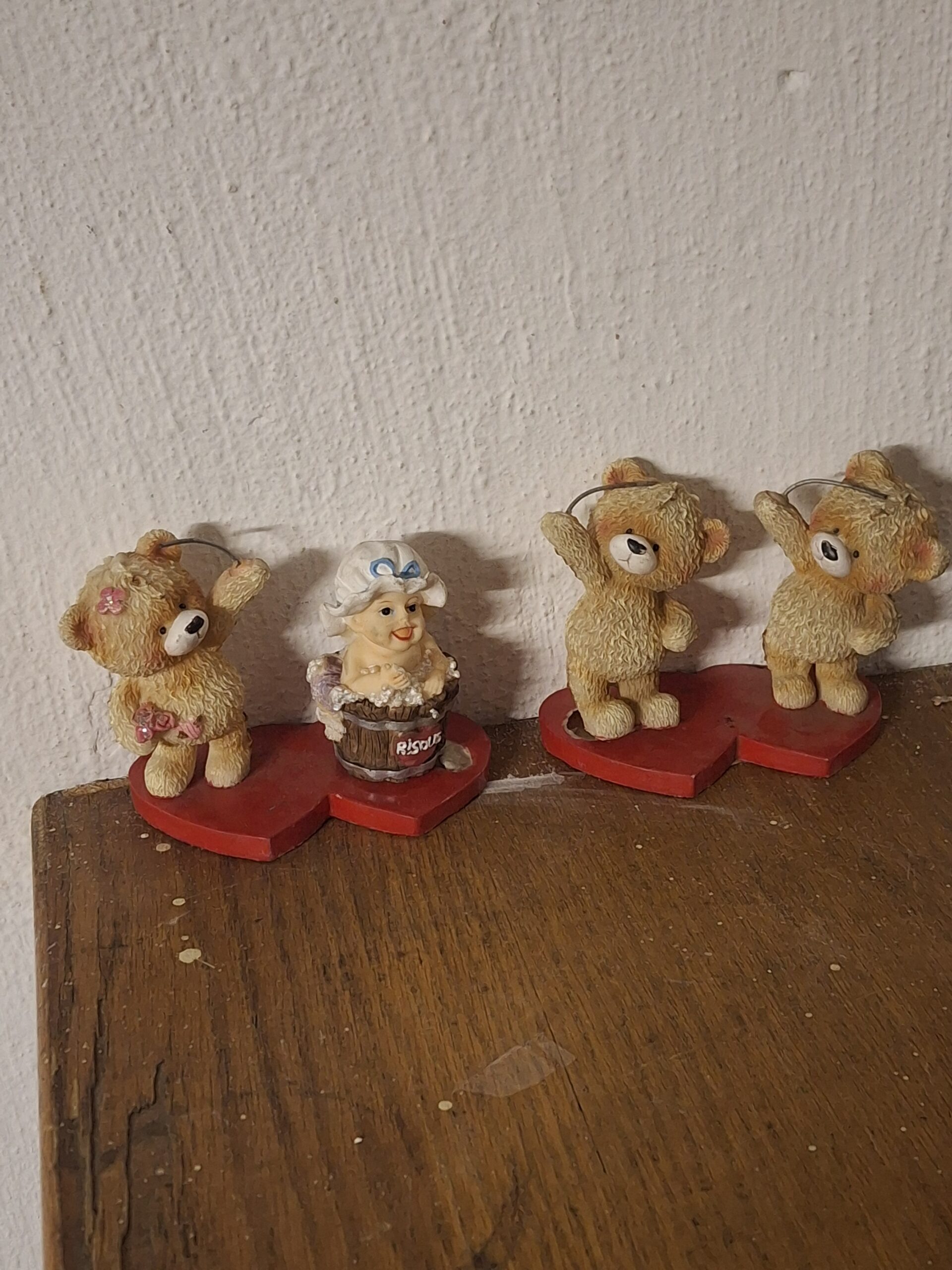 Set of 4 Decorative Figurines on Red Heart Bases